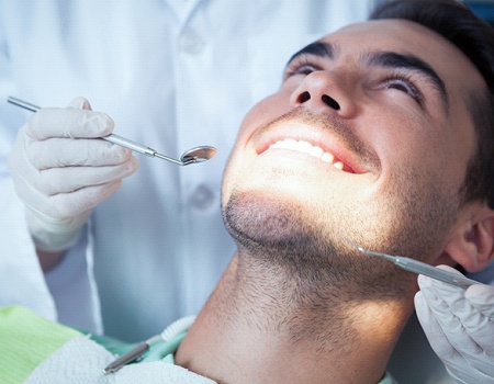 Man getting a dental cleaning