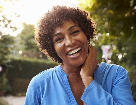 Woman with healthy smile outdoors