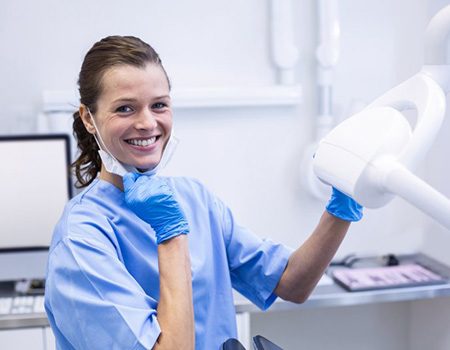 Dental hygienist smiles