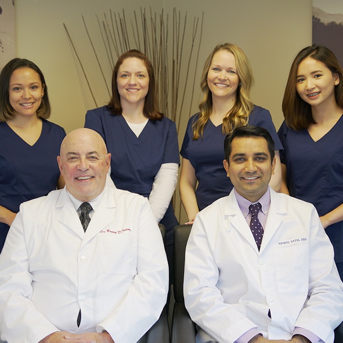 Willow Grove dental team members smiling in dental office