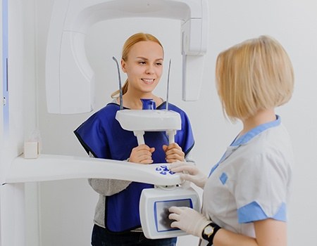 Woman receiving CT cone beam scan